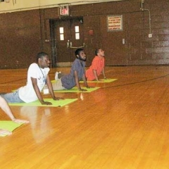 Yoga instructor Irina Kotikova teaches CANY day habilitation participants new poses