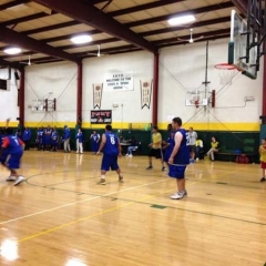 Participants moving around the court.