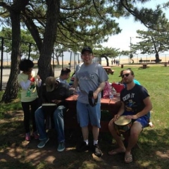 Participants at a picnic table.