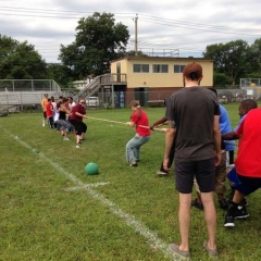 Participants engaged in the game of tug of war.