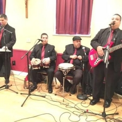 Los Ciegos Del Barrio performing.