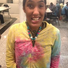 Participant wearing a newly made necklace.