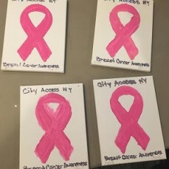 Pink ribbons painted by participants.
