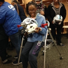 Participant holding Brooklyn Cyclones helmet.