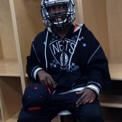 Participant wearing a team helmet.