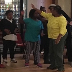 Two participants high-fiving each other.