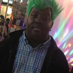 A participant in a green wig.