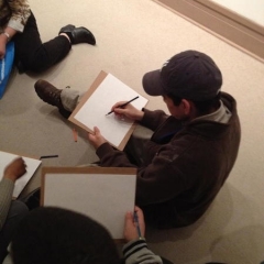 Participating in an art session at The MET.
