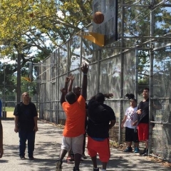 Participants enjoying a game of basketball.