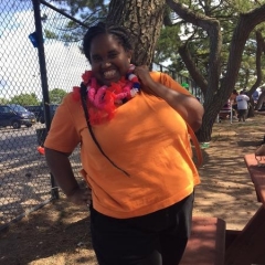 A smiling participant poses for a picture.