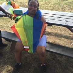 A participant poses with a kite.