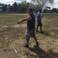 A participant holding a kite