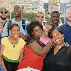 Participants hug for the picture.