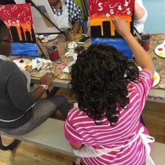 Participant drawing buildings of the New York skyline.