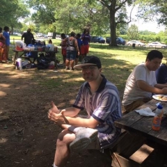 A participant at a picnic table.