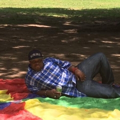 A participant hanging out on a blanket.