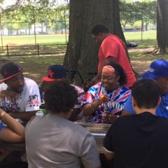 Participants at a picnic table.