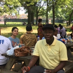A participant at a picnic table.