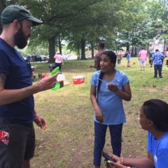 Participants with a water gun.