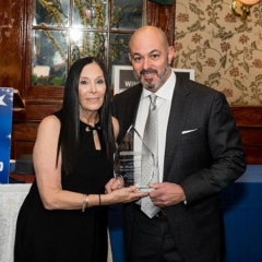 Ilene Rosen, Development & Event Services for City Access and Dr. Frank Mandarino, event honoree. ID: Ilene is handing the award to Dr. Mandarino.