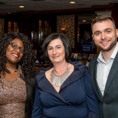 Left to right: Janelle Petters, DayHab Assistant Director; Sophia Rossovsky, Executive Director; Ryan Dillon, DayHab Director.  ID: The group smiles for the camera.