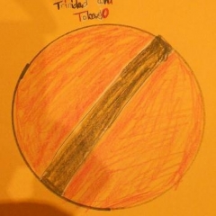 A drawing made for the art contest.  ID: A circle with Trinidad and Tobago flag.