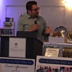 Frank Wilkinson accepting an award.