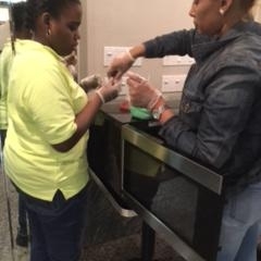 Participants learning to make rice crispy treats.