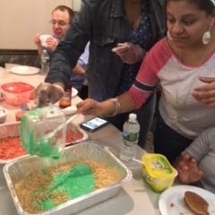 Participants learning to make rice crispy treats.