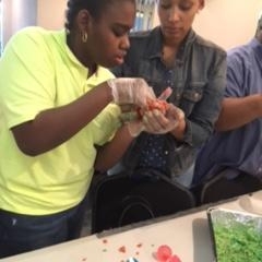 Participants learning to make rice crispy treats.