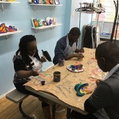 Painting at an art class.