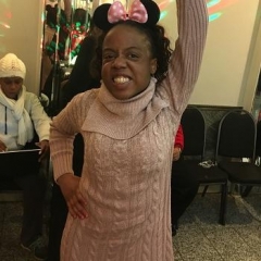 A participant dancing at a Valentine's Day party.