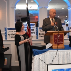 John Martinez accepting an award