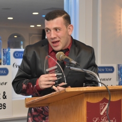 Carmine Mazza accepts an award