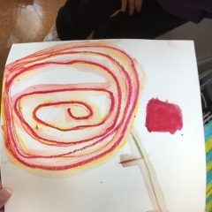 Drawing by a participant.  ID: Abstract art work in red and yellow.