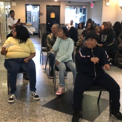 Participants reenact the Rosa Parks story in celebration of the Black History Month