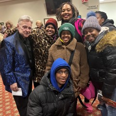 Participants taking pictures with some of the talented performers at the Motown musical.