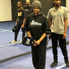 Participant is getting ready to hit her first ball over the net.