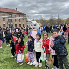 Little kids posing with the bunny.